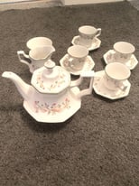Eternal beau teapot ,sugar bowl ,milk jug ,saucers and cups