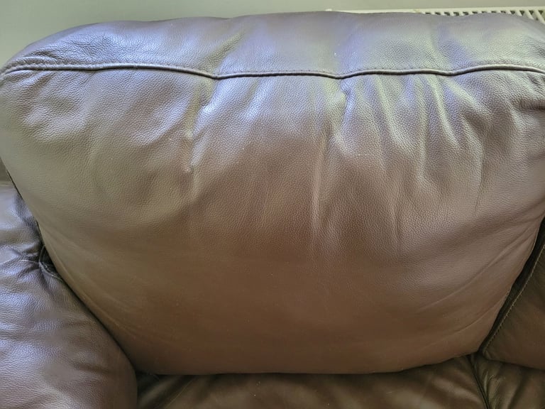 Small brown leather sofa- free