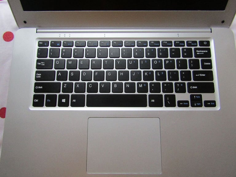 silver JOOMPER 14inch laptop tools in good condition lightly used 64GB own charger