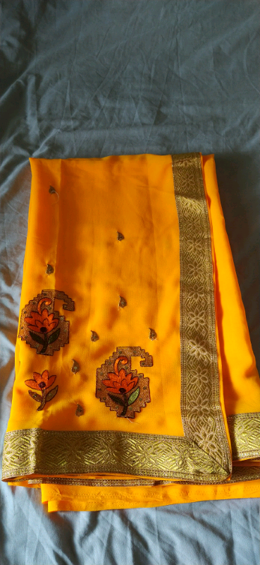 image for Brand New Yellow and Gold Saree 