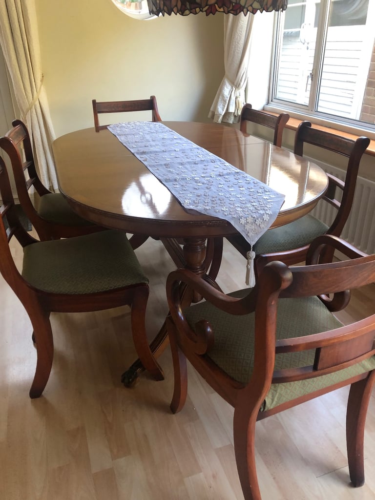 image for Large extendable dining table and 6 chairs 
