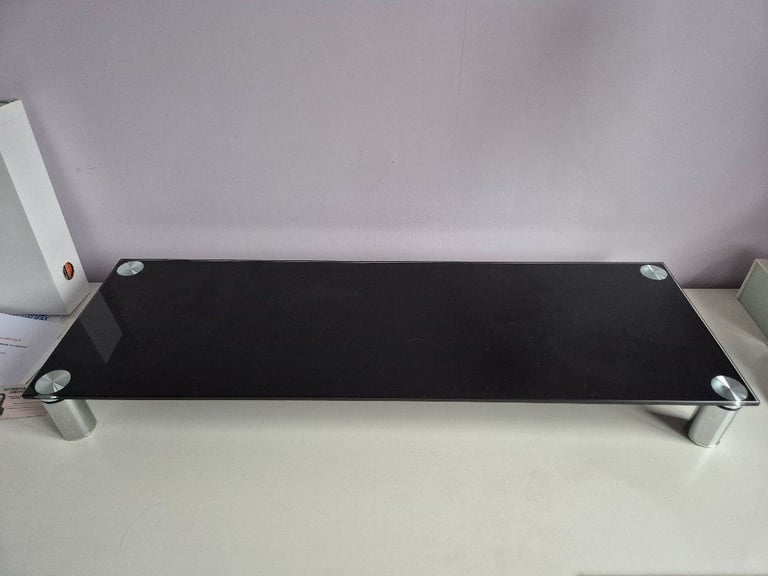 image for Monitor or TV stand riser - black glass with chrome legs - 80cm wide x 26cm deep x nearly 9cm tall