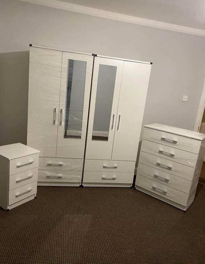 Modern Bedroom Furniture. Bedroom Suit Includes Bedside Tables, Chest of Drawers and Wardrobes