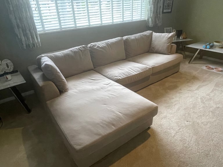 Under a year old sofa with chaise lounge