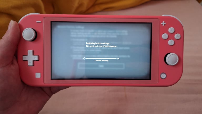 Nintendo switch lite coral pink 