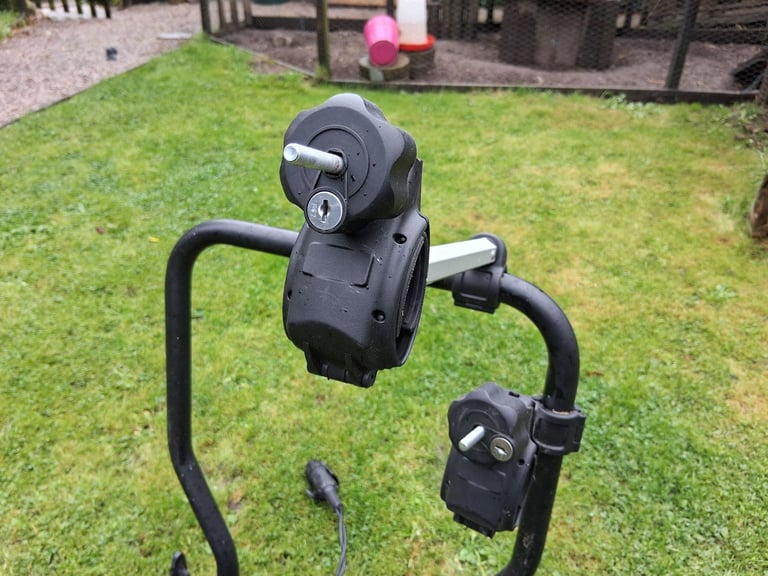 Menabo towbar mounted bike rack. Quality built to hold any bike in particular heavier E-Bikes