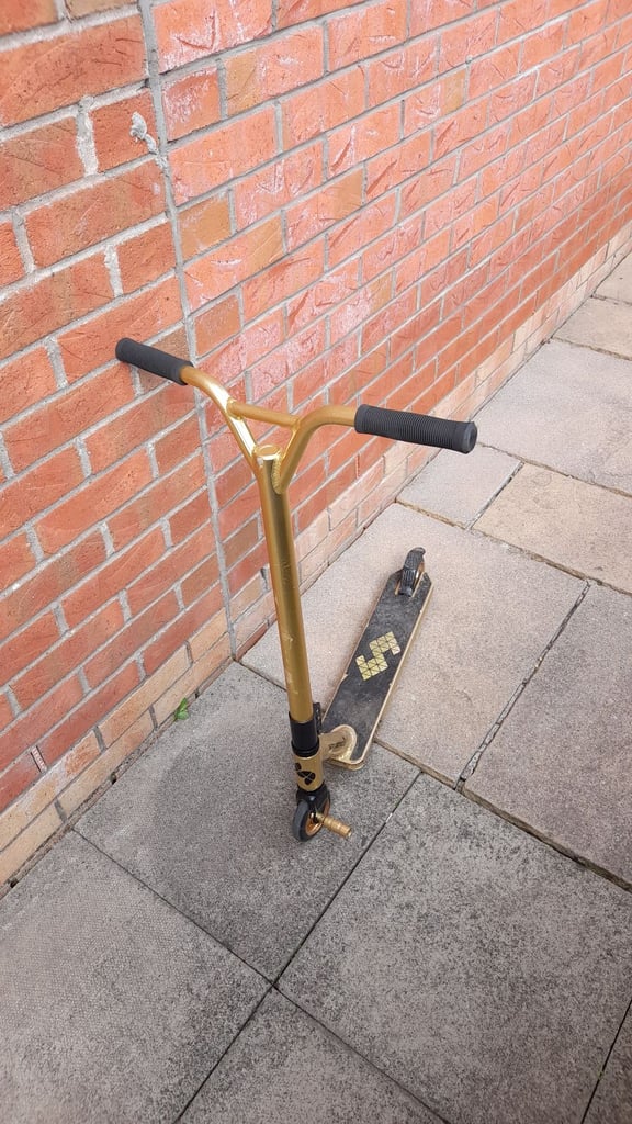 Gold kids stunt scooter (SOLD)