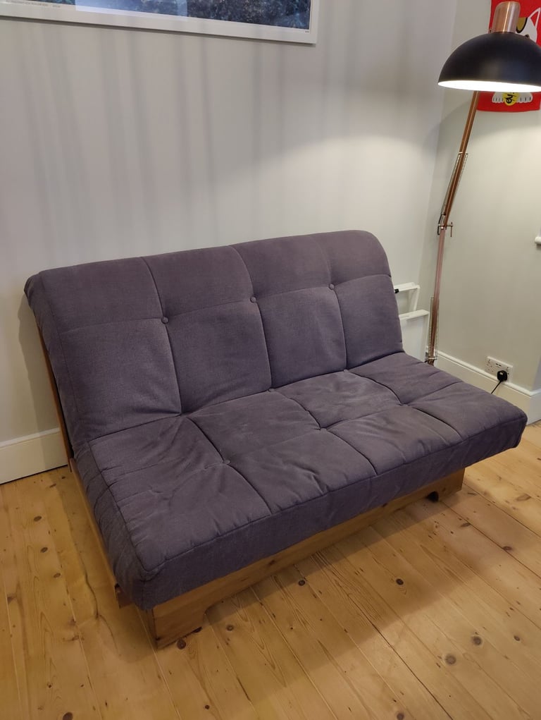 Narrow futon sofabed with underbed drawer