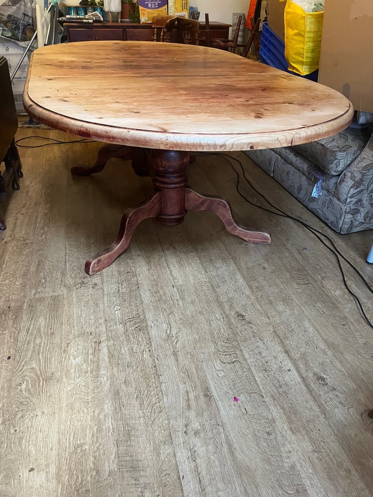 Large extendable solid wood dining table and 8 chairs