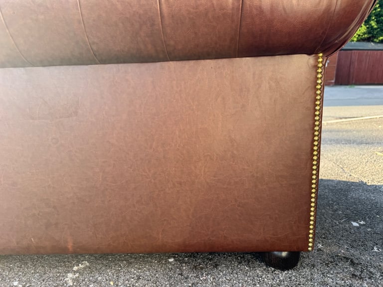 Pair of chesterfield faux brown leather club armchairs 