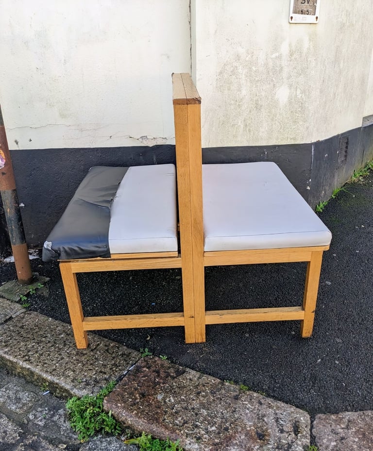 Double sided bench with partition.