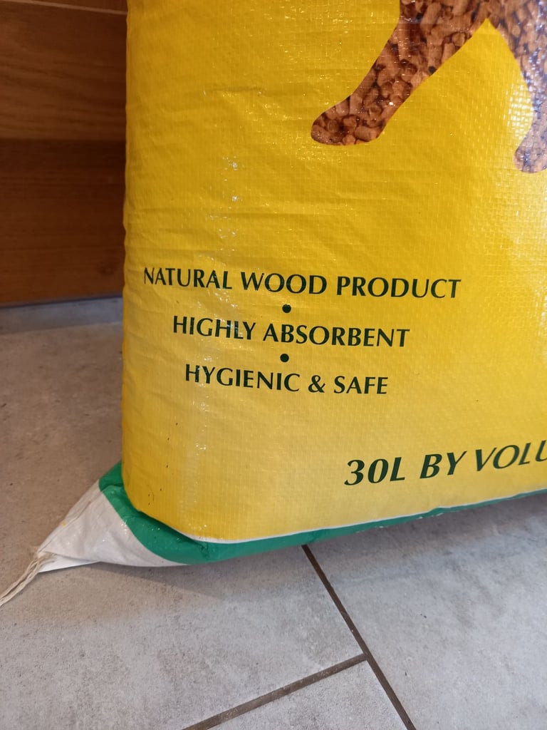Opened pine pellets cat litter 