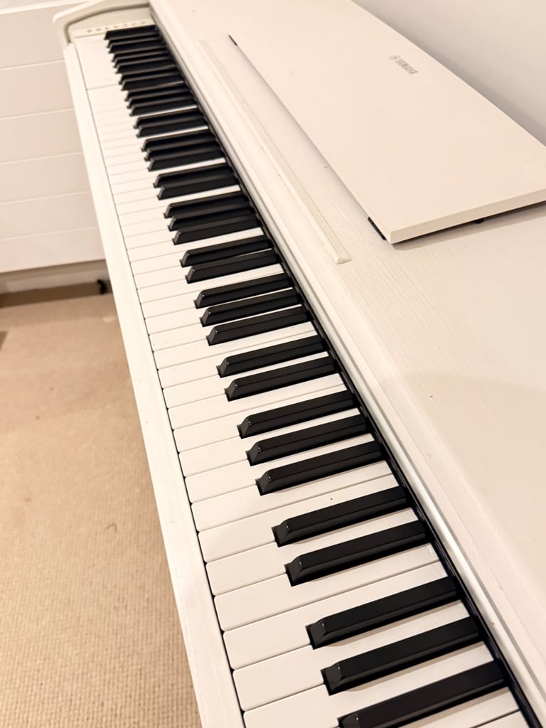 Yamaha white Piano in great condition ( like new) for £500