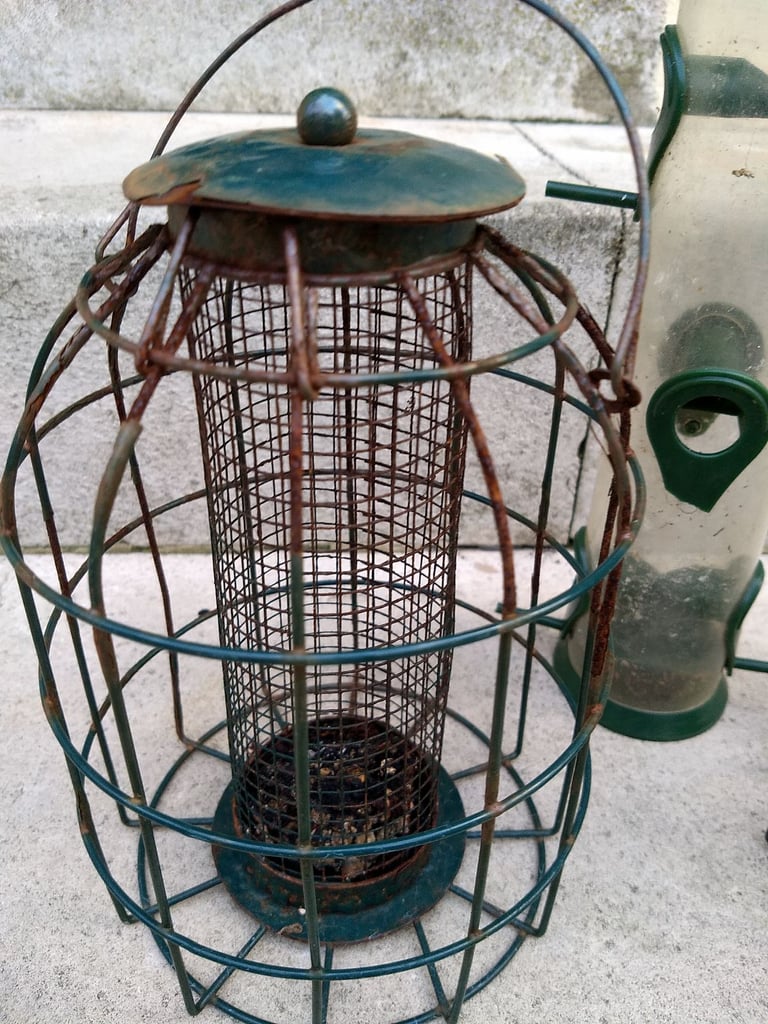 Bird feeders. 3 different types. take nuts and seeds.