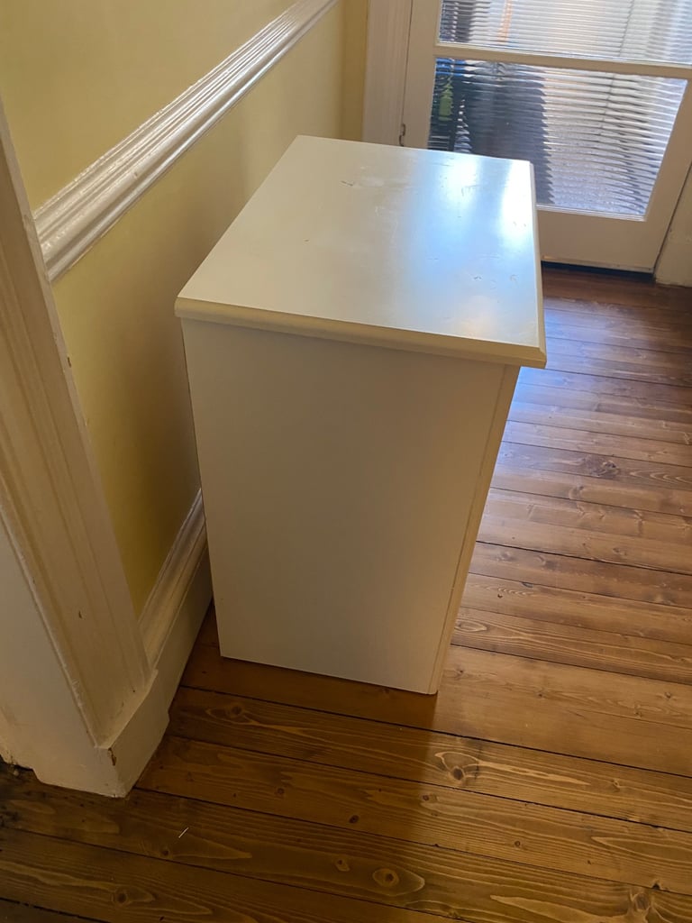 White solid wood side table with drawer and shelf/cubby