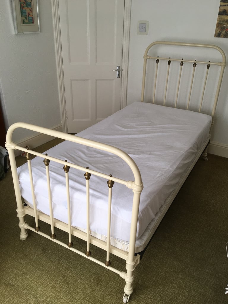 image for Vintage French brass & cream cast iron single bed on brass & china castors 