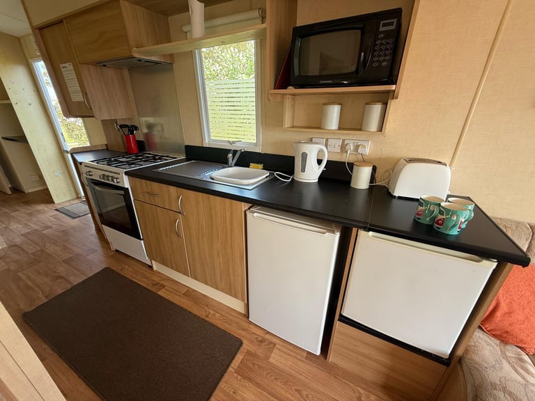 STUNNING STATIC CARAVAN BY THE BEACH FREE 2025 SITE FEES ABERGELE NORTH WALES 