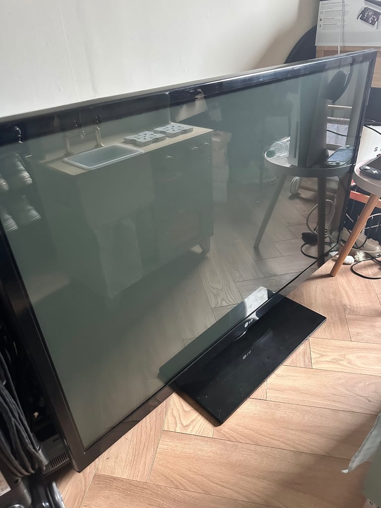 image for 55” LG Tv with remote and cables 