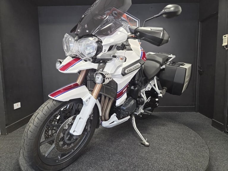 2013 Triumph Tiger Explorer 1215 in white with luggage.
