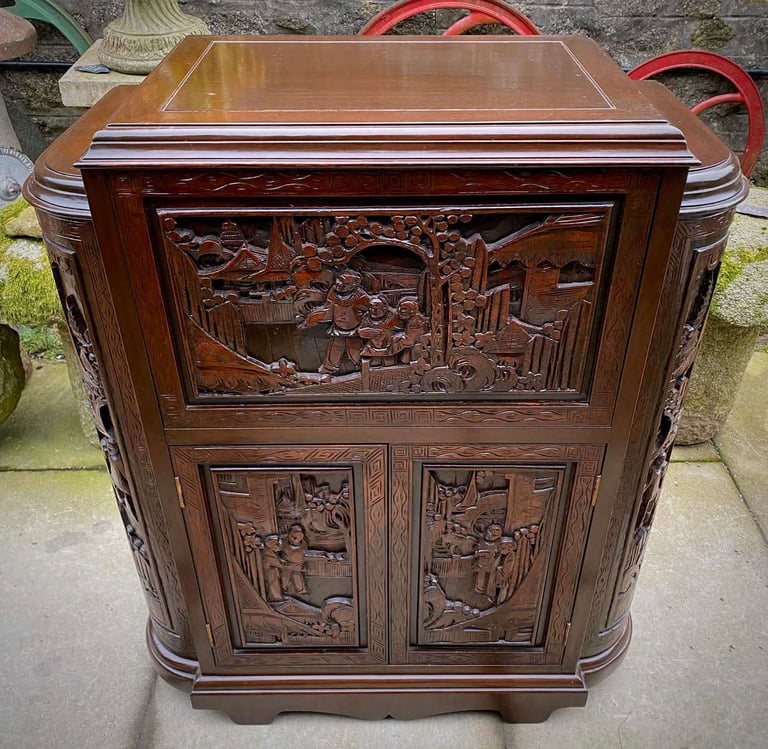 20th century Chinese heavily carved camphor wood cocktail bar cabinet