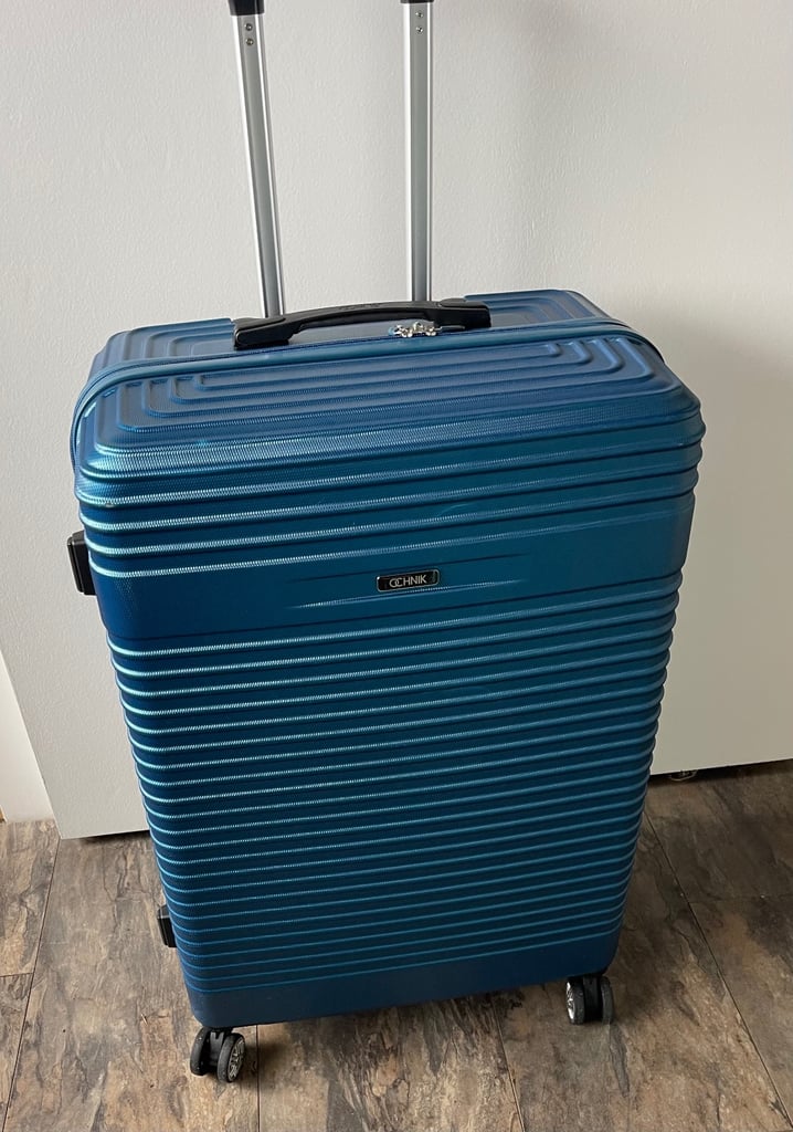 Large suitcase on wheels. Used just once on a return journey lightweight large 