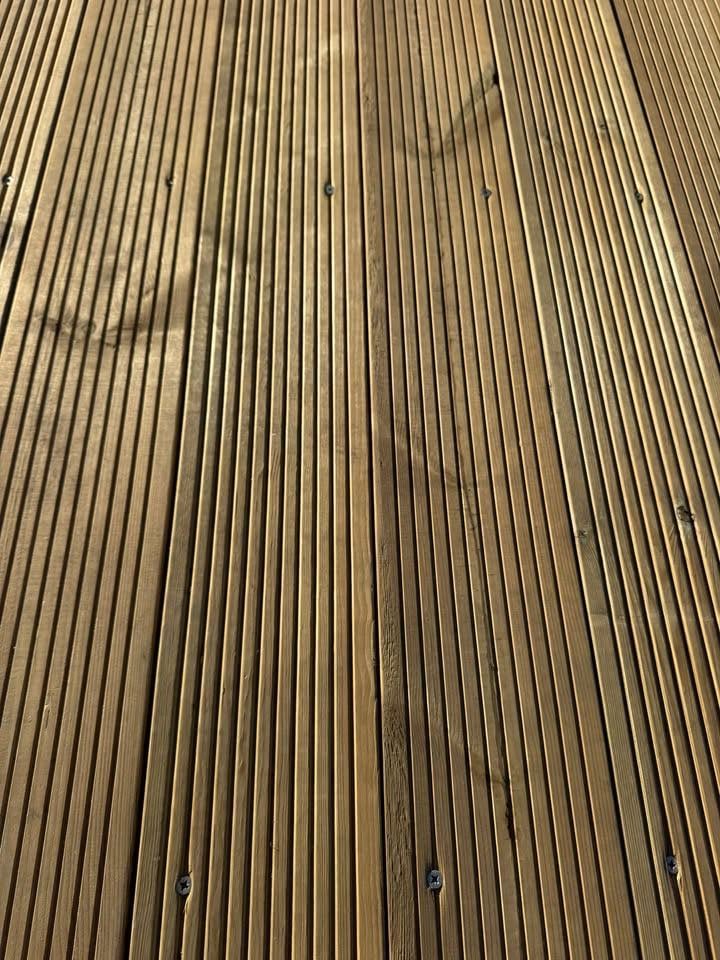 Treated softwood decking and lengths of 4x2 timber