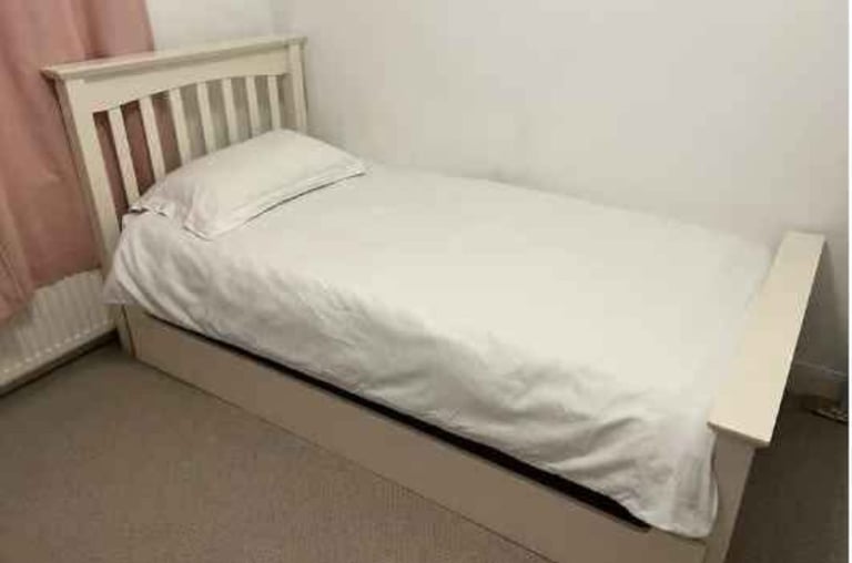 Single bed frame with mattress and underneath drawer 