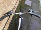 Ammaco Desire Hybrid Bike in good condition with rear rack carrier, a new chainguard, mudguards