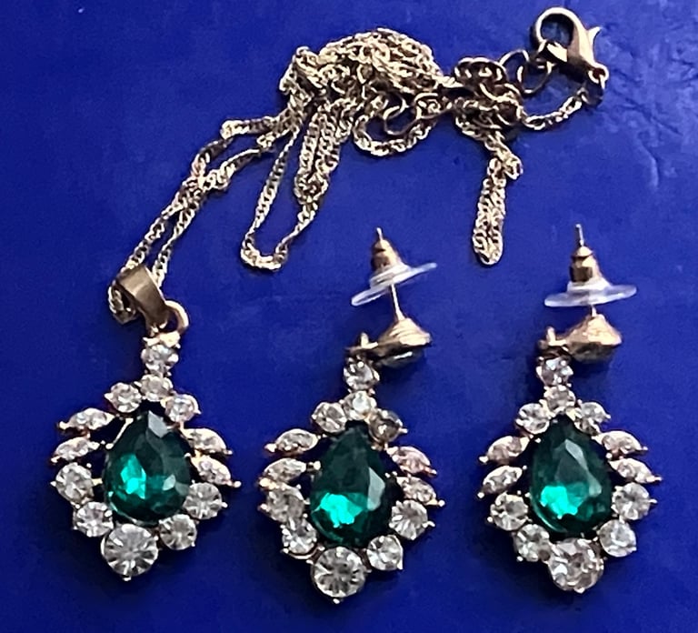 Ladies jewellery rolled gold white cubic zirconia & emerald earrings & necklace set.