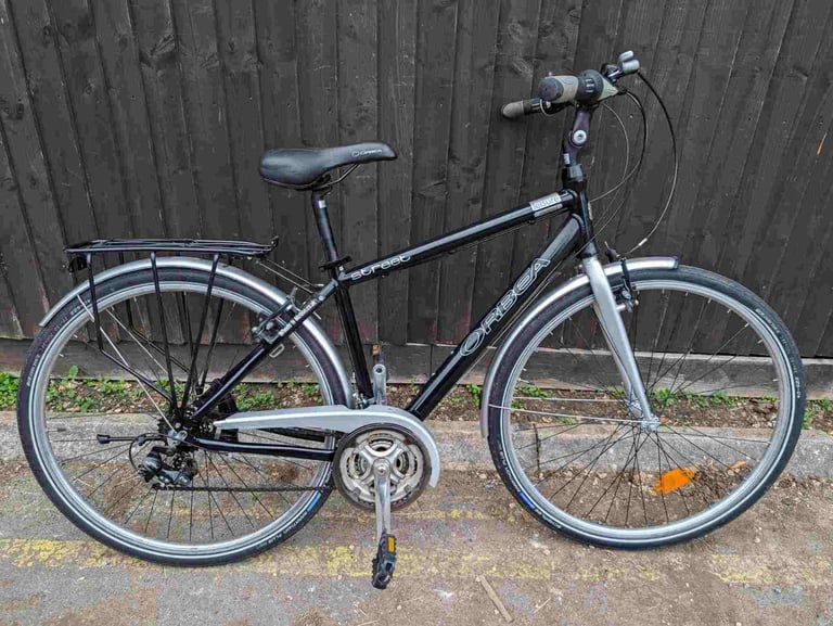 image for Orbea Street Leisure Equiped Hybrid bike in good condition with rear rack carrier, mudguards