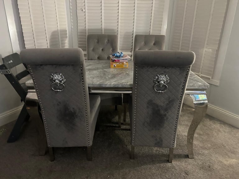 image for Dining table and chairs