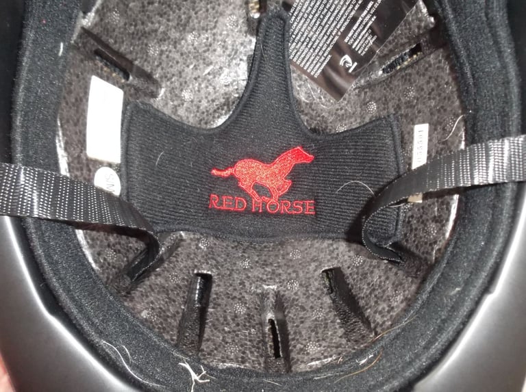 Childs horse riding safety helmet and storage bag