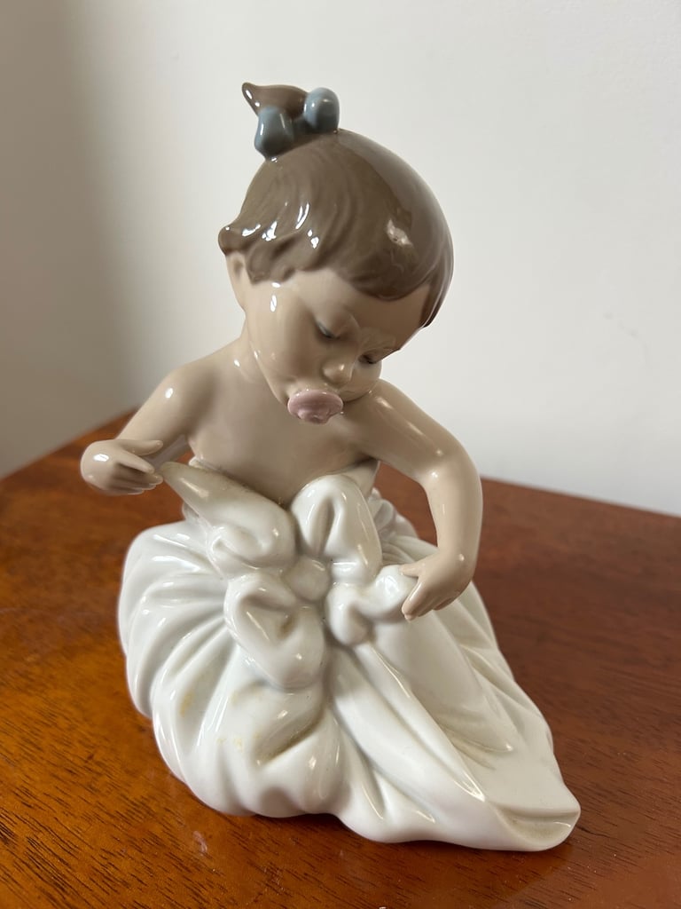 image for NAO by Lladro girl in blanket