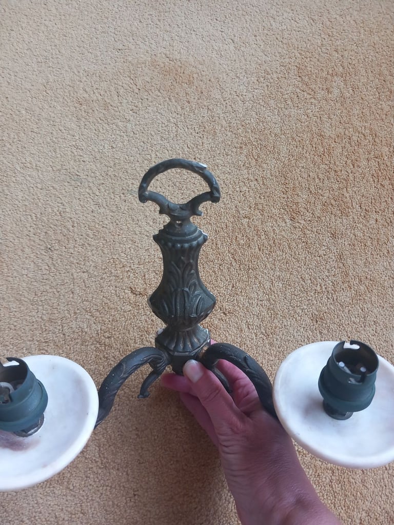 A pair of brass wall lights 