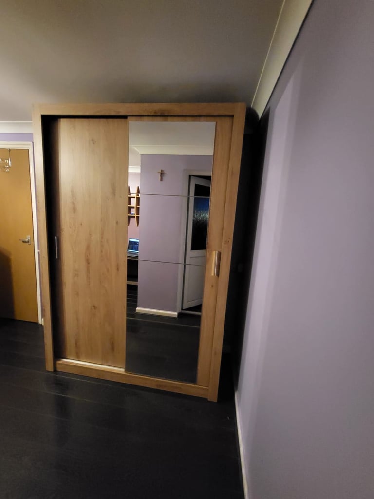 Large double wardrobe with mirror panel