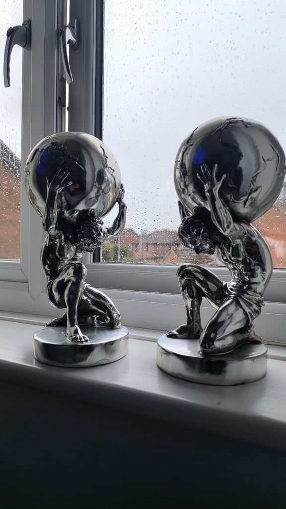 image for 2 Atlas statues 