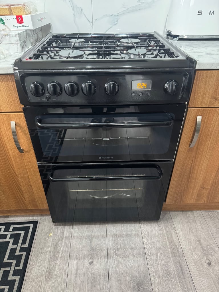 image for Hotpoint black gas cooker with oven and grill