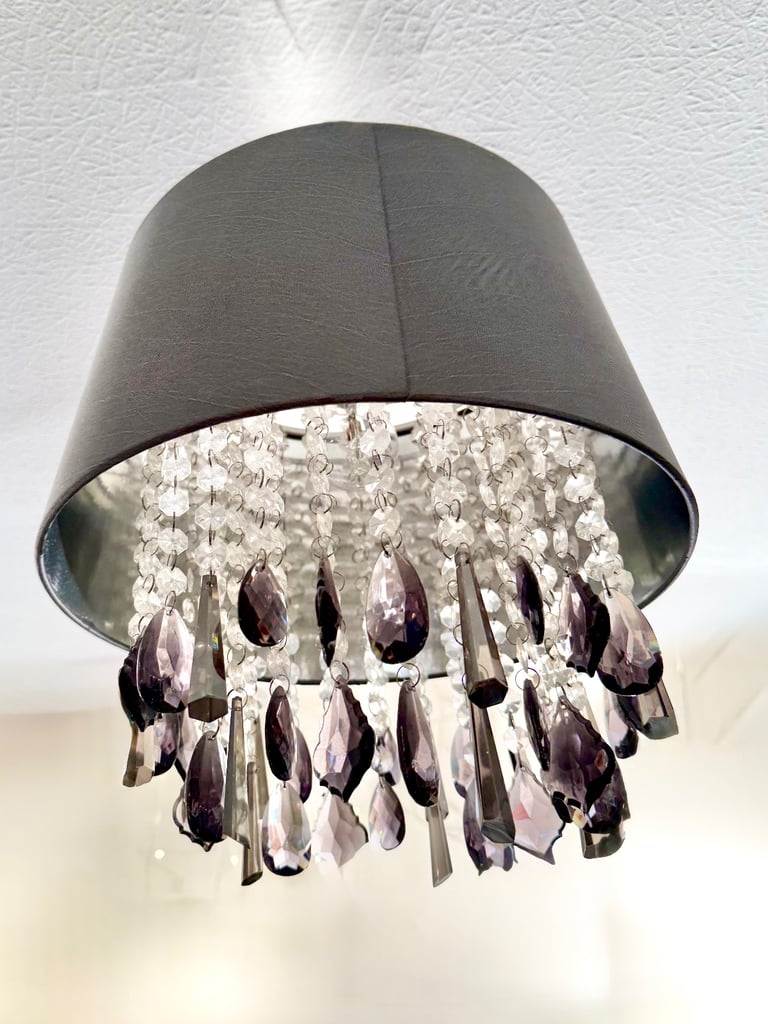 Grey pleated satin shade with drop cristals Measuring 35x 35 cm. Drop crystal plastic 