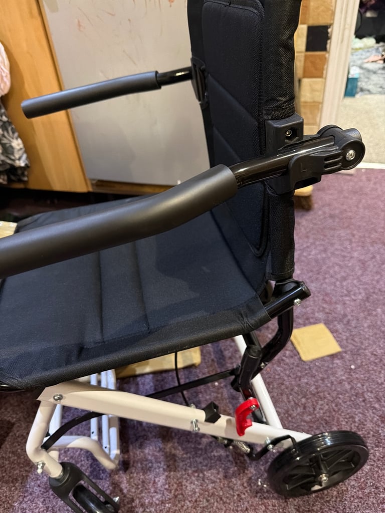 Transport lightweight wheel chair brand new 