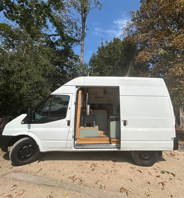 Off-grid Campervan with wood burning stove 