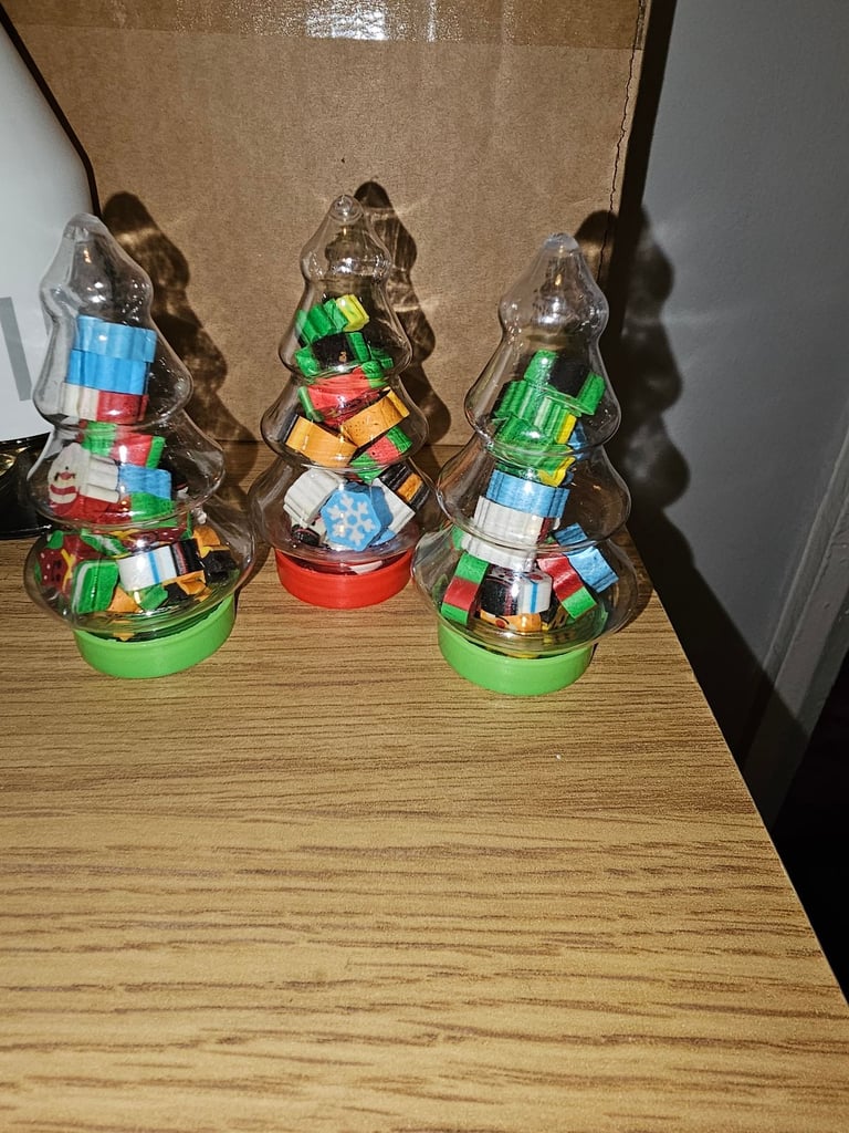 Mini novelty Christmas rubbers/erasers in a Christmas tree tub £2 each