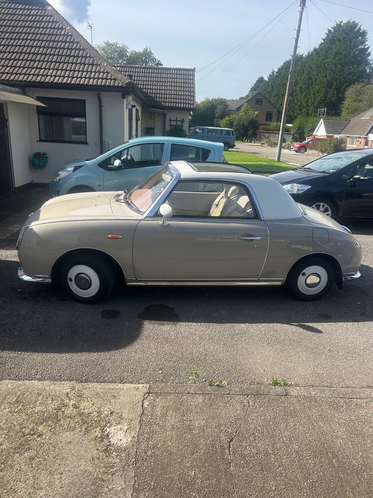 image for Nissan Figaro in a rare Topaz mist colour. 