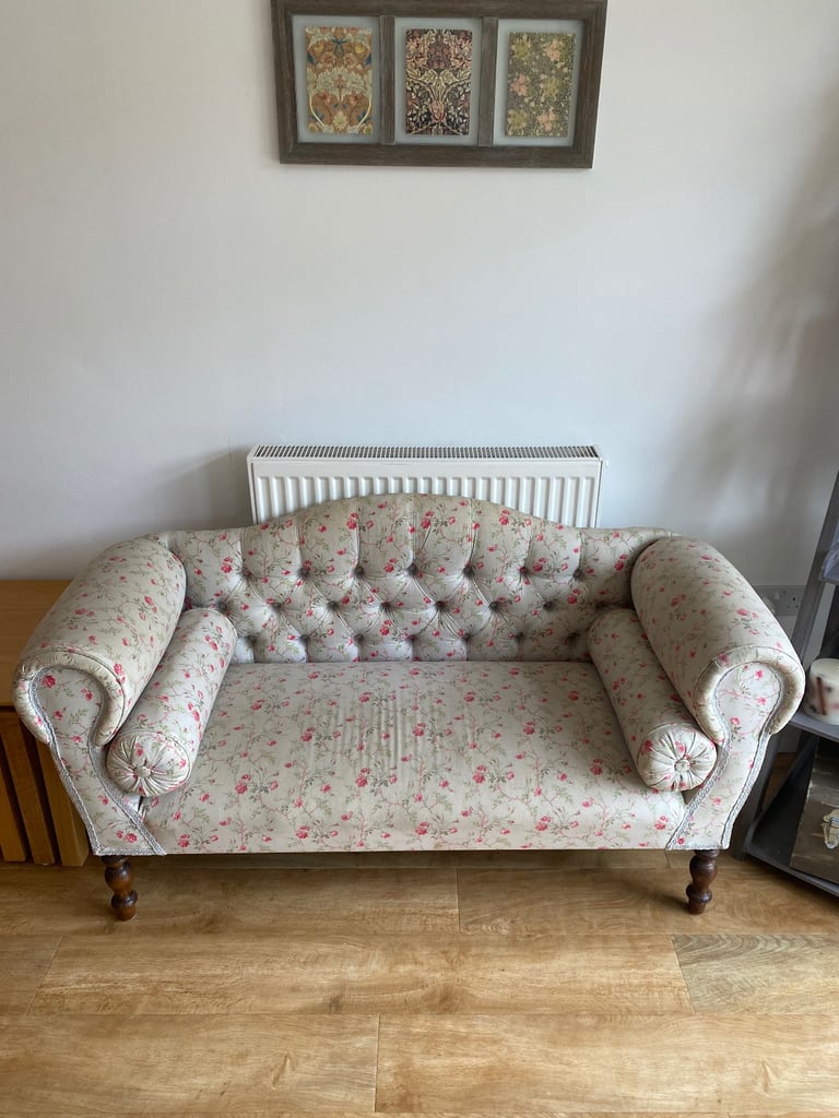 Ornate vintage small sofa