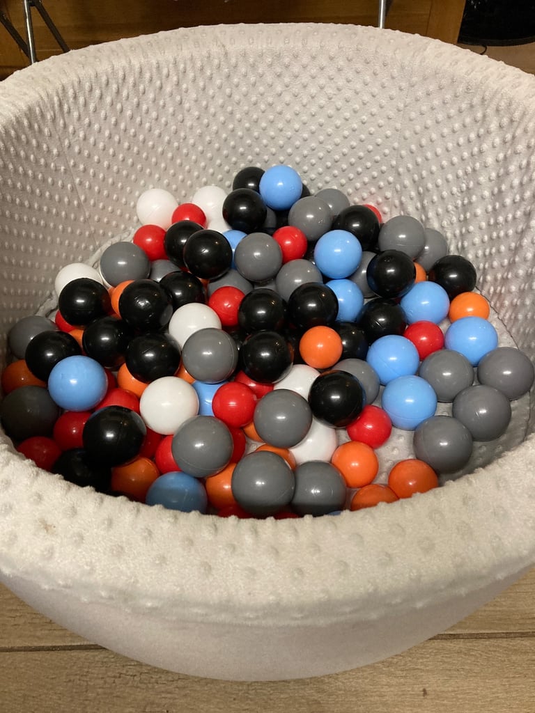 Grey soft ball pit with balls 