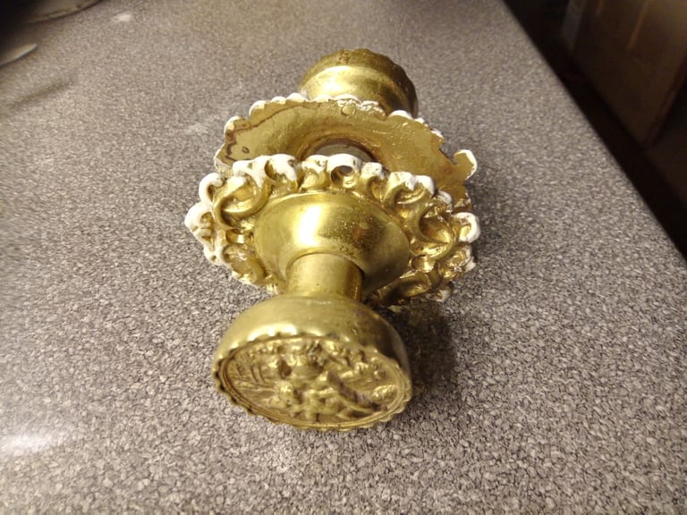 image for Ornate metal interior door knobs.