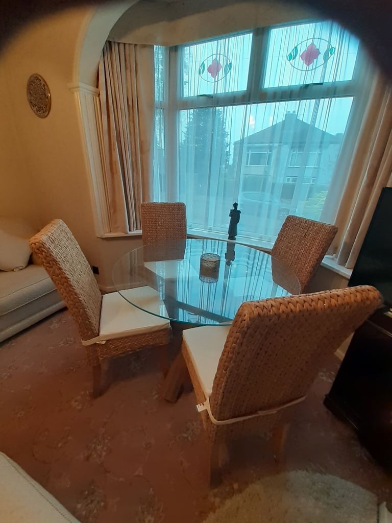 image for DINING TABL,E GLASS TOP & 4 HIGH BACK RATTAN CHAIRS WITH CUSHIONS