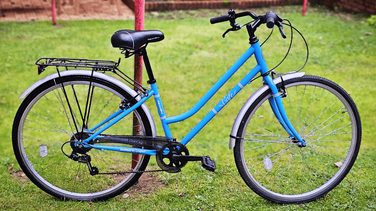 image for Step-through hybrid bike with sprung panniers and spring-suspension saddle