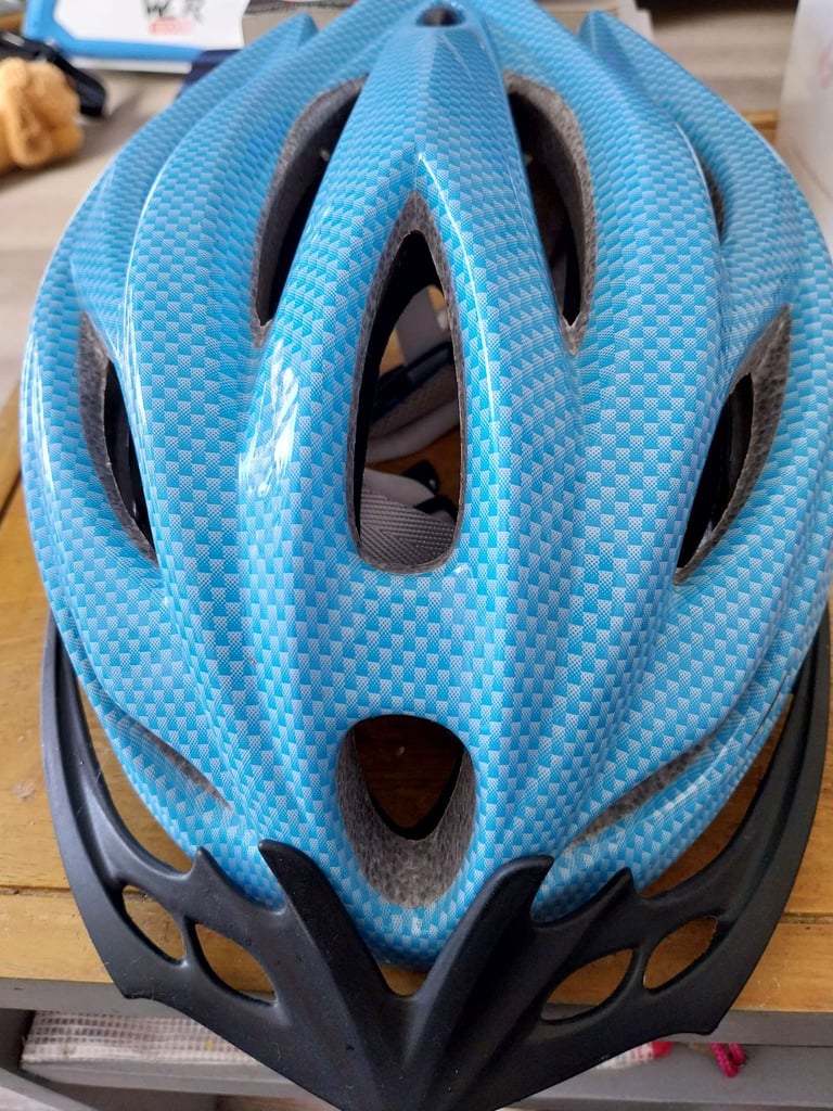 New blue adult size cycle helmet