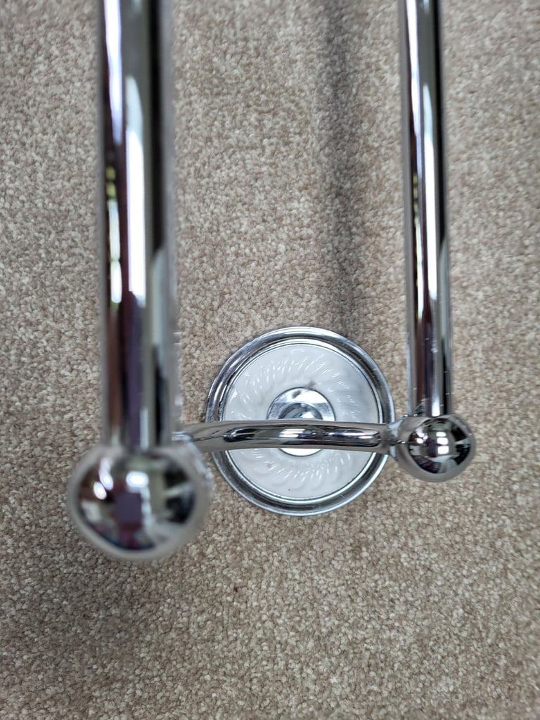 Towel rail and toilet roll holder