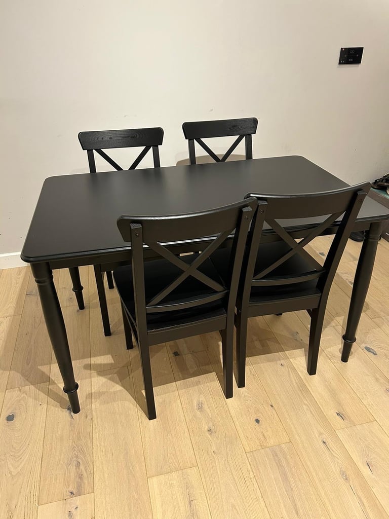 image for IKEA dinning table with four chairs 